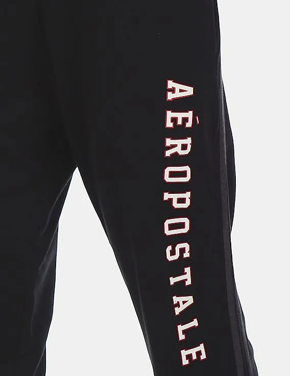 Aeropostale Men Black Mid Rise Drawstring Waist Solid Joggers