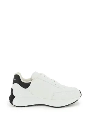 ALEXANDER MCQUEEN Luxurious Women's Leather Sneakers with Embossed Monogram and Oversized Rubber Sole