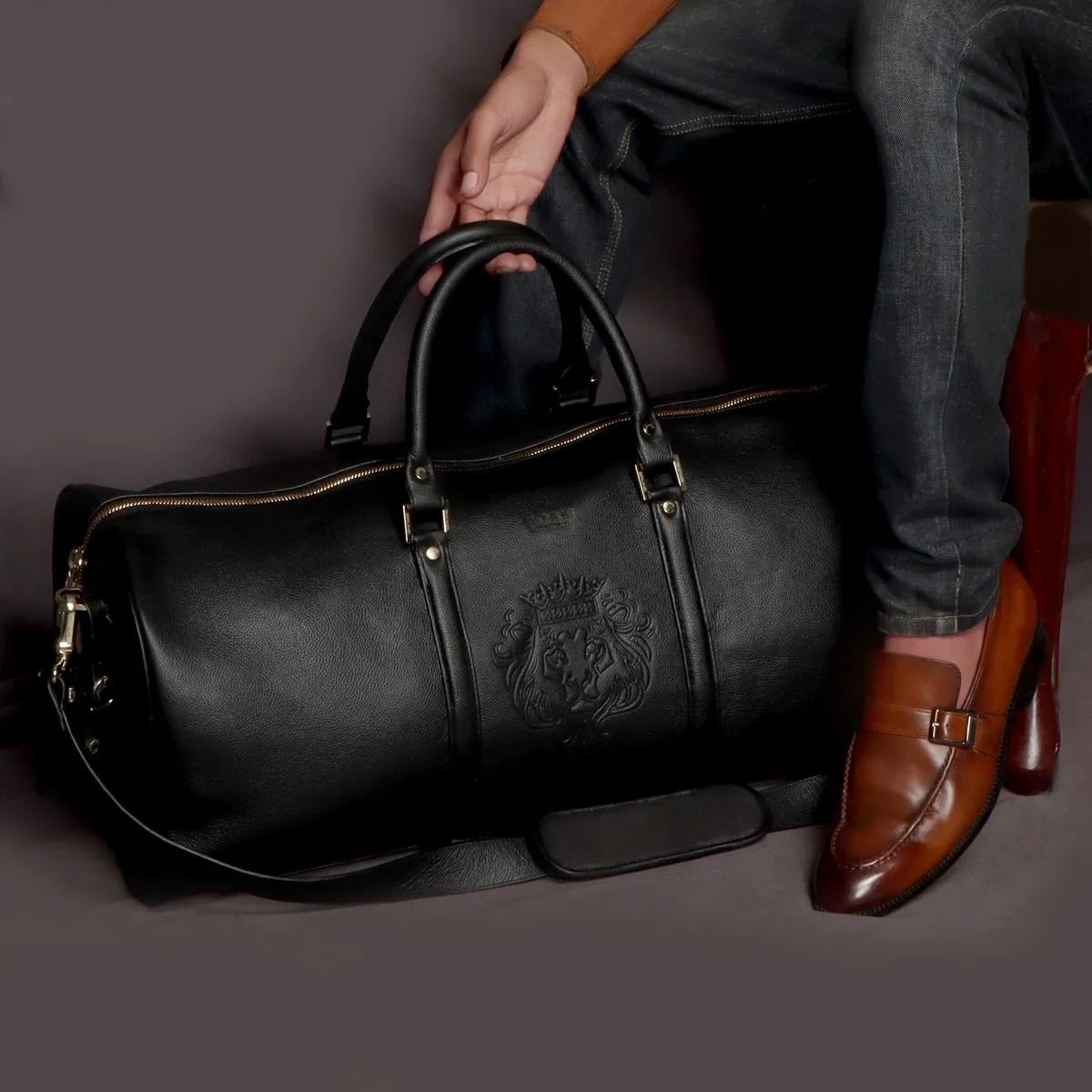 Embossed Lion Unisex Black Textured Leather Duffle Bag With Bag Tag By Brune & Bareskin