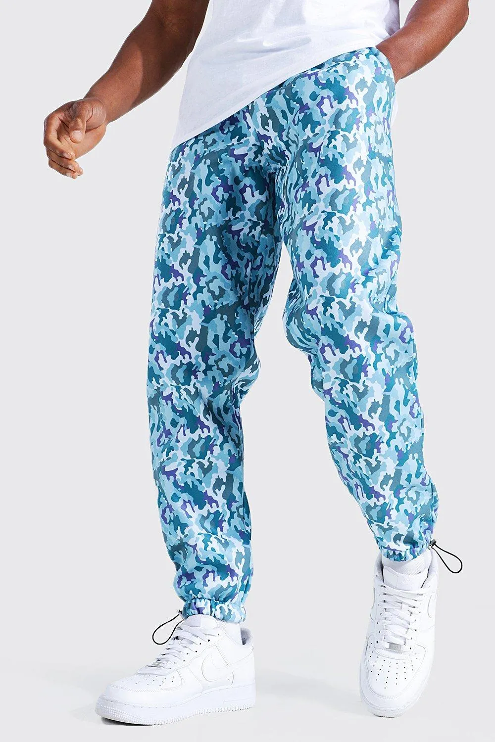 Regular Fit Camo Print Joggers With Toggles | boohooMAN UK