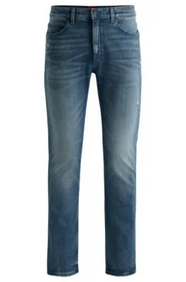 Slim-fit jeans in mid-blue distressed stretch denim